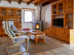 Televisyen dan/atau pusat hiburan di Holiday Home Simano by Interhome