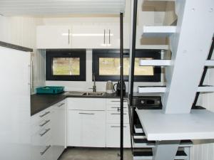 Kuchyň nebo kuchyňský kout v ubytování Holiday Home Bosco-TICINO TICKET Inklusive!-7 by Interhome