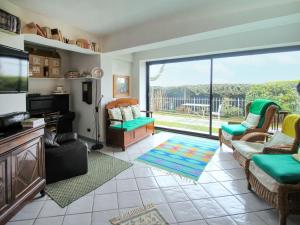 a living room with a large sliding glass door at Holiday Home Pietro by Interhome in Stresa