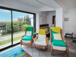 a room with chairs and a couch and a table at Holiday Home Pietro by Interhome in Stresa