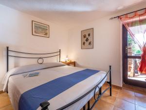 A bed or beds in a room at Holiday Home Coppia 2 by Interhome