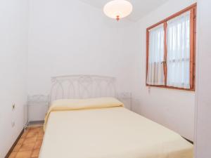 Posteľ alebo postele v izbe v ubytovaní Holiday Home Villa Monte Nai - REI420 by Interhome