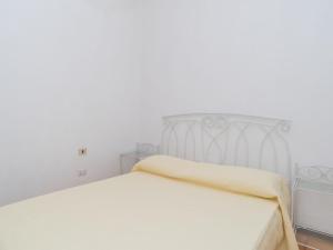 Posteľ alebo postele v izbe v ubytovaní Holiday Home Villa Monte Nai - REI420 by Interhome