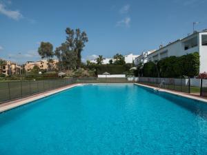 Bazén v ubytovaní Holiday Home La Palmera by Interhome alebo v jeho blízkosti