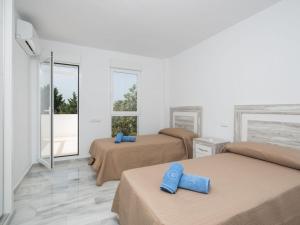Posteľ alebo postele v izbe v ubytovaní Holiday Home La Palmera by Interhome