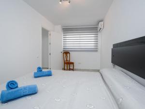 Posteľ alebo postele v izbe v ubytovaní Holiday Home La Palmera by Interhome