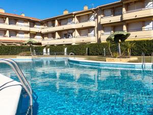 The swimming pool at or close to Apartment Edificio Tamarius by Interhome