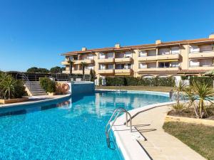 The swimming pool at or close to Apartment Edificio Tamarius by Interhome