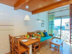A seating area at Apartment Edificio Tamarius by Interhome