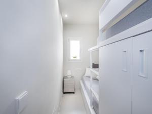Postel nebo postele na pokoji v ubytování Apartment Attic Sea Views by Interhome