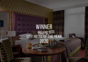 Voodi või voodid majutusasutuse Dublin Skylon Hotel toas
