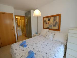 Posteľ alebo postele v izbe v ubytovaní Apartment Residencial Mar I by Interhome + 9 fotografií