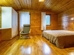 Postel nebo postele na pokoji v ubytování Holiday Home Lahdeke by Interhome