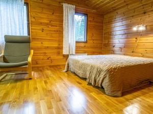 Postel nebo postele na pokoji v ubytování Holiday Home Lahdeke by Interhome