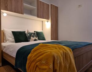 Postel nebo postele na pokoji v ubytování Downtown Apartment Ela