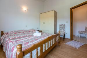 Postel nebo postele na pokoji v ubytování Apartments Lino