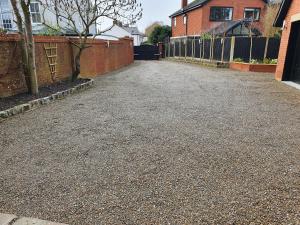 an empty driveway in front of a house at The Old Piggery - Close to Lytham, Preston & Blackpool in Freckleton