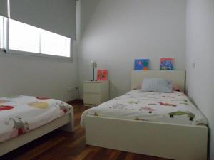 Postel nebo postele na pokoji v ubytování Casa Voltora