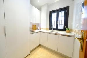 Kuchyňa alebo kuchynka v ubytovaní Patio Rialto Apartment