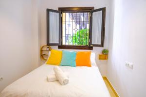 Postel nebo postele na pokoji v ubytování Patio Rialto Apartment