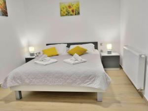 Postel nebo postele na pokoji v ubytování Fancy Apartments Dream
