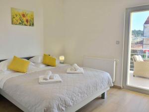 Postel nebo postele na pokoji v ubytování Fancy Apartments Dream