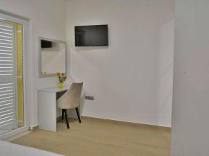 TV a/nebo společenská místnost v ubytování Fancy Apartments Dream