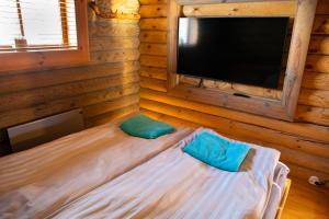 Postel nebo postele na pokoji v ubytování Nuustakumajad