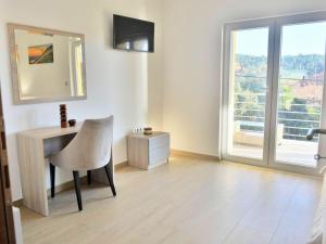 TV a/nebo společenská místnost v ubytování Fancy Apartments Dream
