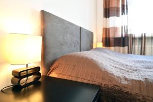 Posteľ alebo postele v izbe v ubytovaní Apartment Trnje + 37 fotografií
