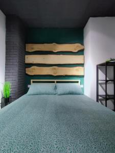 Ένα ή περισσότερα κρεβάτια σε δωμάτιο στο LoL apartment