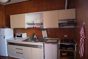 Cucina o angolo cottura di b&b Wu Giada