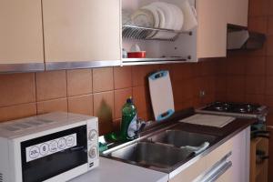 Cucina o angolo cottura di b&b Wu Giada