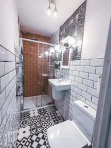 Koupelna v ubytování Plaza Hotel