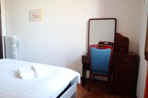 Letto o letti in una camera di b&b Wu Giada