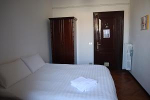 Letto o letti in una camera di b&b Wu Giada