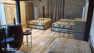 Posteľ alebo postele v izbe v ubytovaní Rocca degli Olivi