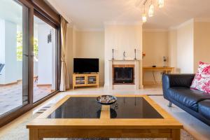 TV a/nebo společenská místnost v ubytování Finca San Antonio Holiday Rental