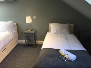 Кровать или кровати в номере St Simeon