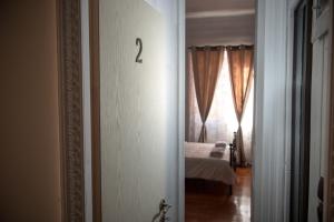 Posteľ alebo postele v izbe v ubytovaní 1920s Rooms