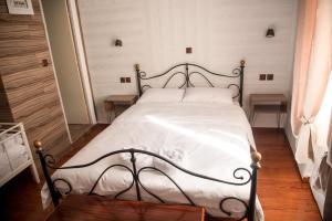 Posteľ alebo postele v izbe v ubytovaní 1920s Rooms