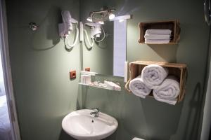 Kúpeľňa v ubytovaní 1920s Rooms + 37 fotografií