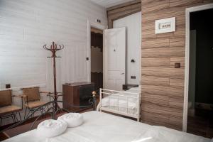 Posteľ alebo postele v izbe v ubytovaní 1920s Rooms