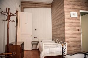 Posteľ alebo postele v izbe v ubytovaní 1920s Rooms