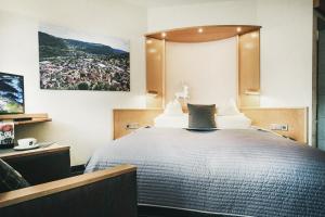 Postel nebo postele na pokoji v ubytování Hotel Koch