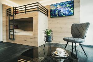 TV a/nebo společenská místnost v ubytování Hotel Koch