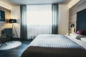 Postel nebo postele na pokoji v ubytování Hotel Koch