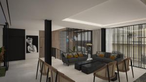 a living room with a couch and a table at M. HOTEL in San Antonio