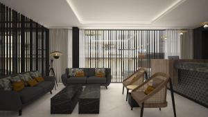 a living room with two couches and a table at M. HOTEL in San Antonio
