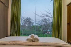 Llit o llits en una habitació de Tusker Tea County